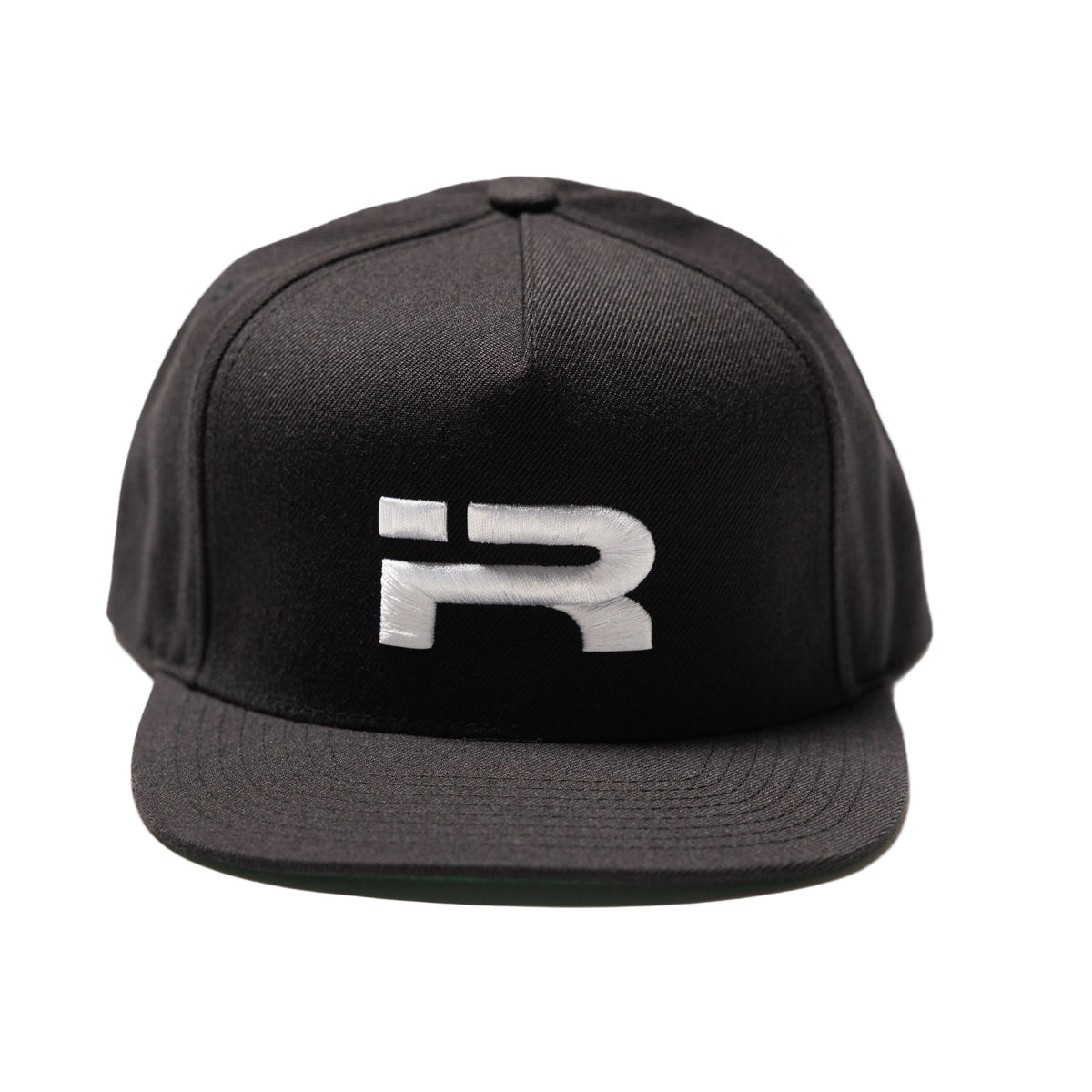 A black flat-brim snapback cap featuring a stylized white embroidered letter 'R' on the front, set against a plain white background.